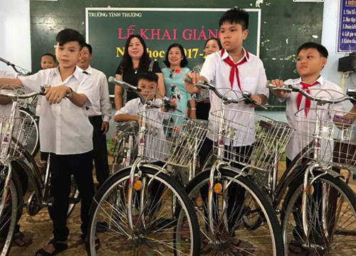 Students in compassion school get bicycles for the new school year