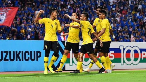 Malaysia enter Suzuki Cup’s final after gripping draw with Thailand