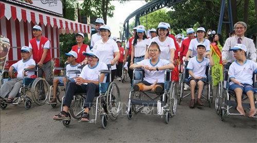 HCM City: Thousands walk for AO victims, people with disabilities