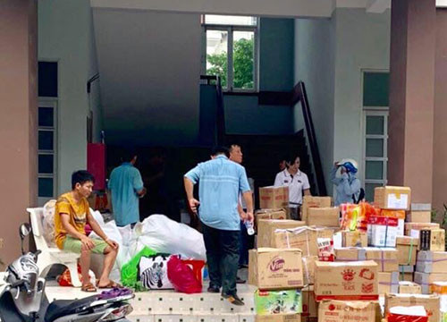 Collecting books, notebooks for students in the flood-hit central provinces